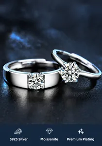 Macro detail of S925 silver couple rings featuring a six-prong moissanite setting