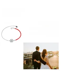 Close-up of Moissanite sterling silver bracelet with red braided rope and metallic chain