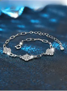 Close-up of S925 sterling silver four-leaf clover bracelet with sparkling clear zircon
