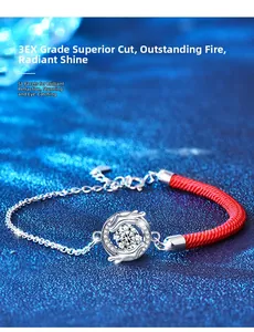Macro shot of 925 silver dragon bracelet with 3EX cut moissanite on red rope