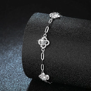 S925 sterling silver four-leaf clover bracelet with pavé-set stones and paperclip chain