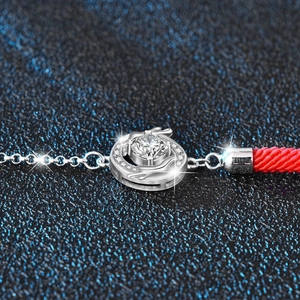 925 silver dragon year red cord bracelet featuring a large round moissanite pendant