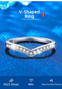 Macro shot of S925 sterling silver V-shaped ring with pavé moissanite on blue surface