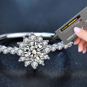 925 silver moissanite sunflower ring with double halo petals and diamond tester test