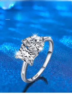 Detail of S925 silver ring featuring 58-facet pear and square cut cubic zirconia