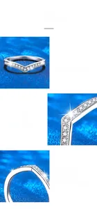 Detailed macro view of 925 sterling silver V-shaped ring featuring prong-set moissanite stones