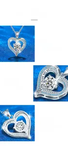 Macro detail of S925 sterling silver heart pendant with moissanite and blue accent stones