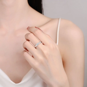 Elegant S925 sterling silver ring with marquise-cut moissanite on a model's hand