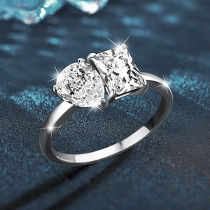 925 silver Toi et Moi ring featuring pear and rectangular cut moissanite stones