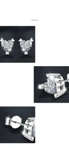 Macro detail of heart-cut moissanite earrings in classic three-prong 925 silver setting