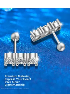 Macro view of S925 sterling silver screw back earrings with three sparkling zircons