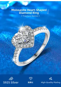 Macro shot of heart-cut moissanite diamond ring in S925 sterling silver on blue glitter