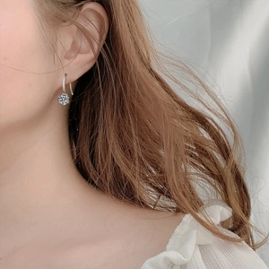 Classic 925 sterling silver six-prong moissanite drop earrings on female model