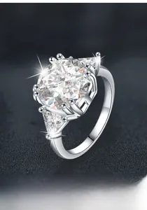 Macro shot of 925 sterling silver three-stone ring with a 5ct moissanite center stone