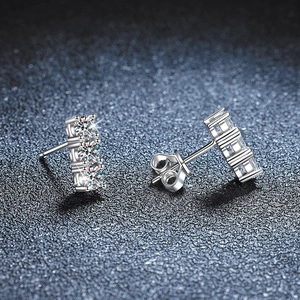 Elegant S925 sterling silver stud earrings featuring three brilliant moissanite stones