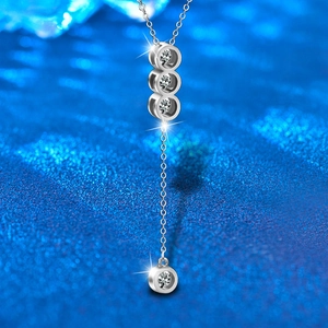 Vertical 925 sterling silver tassel necklace with four sparkling moissanite pendants