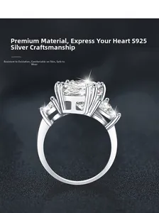 Detailed close-up of S925 silver three-stone ring with oval and pear shaped stones