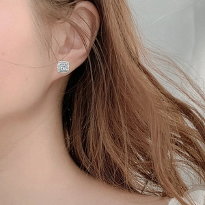 Elegant 925 sterling silver square moissanite stud earrings on female model