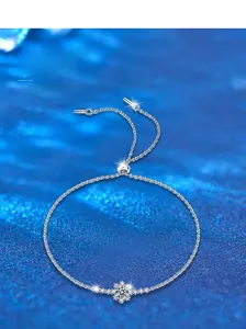 Detailed close-up of S925 sterling silver snowflake bracelet with sparkling moissanite stones