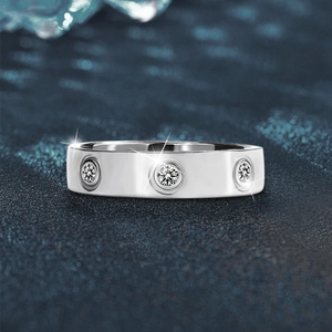 Elegant 925 sterling silver ring featuring three round-cut moissanite stones on a blue base