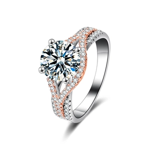 Two-tone moissanite ring with twisted rose gold and silver bands in 925 sterling silver