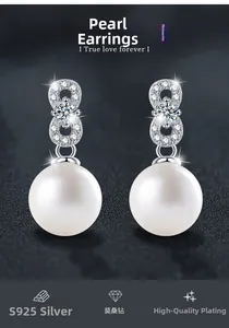 Detailed view of S925 silver infinity stud earrings with moissanite and pearls