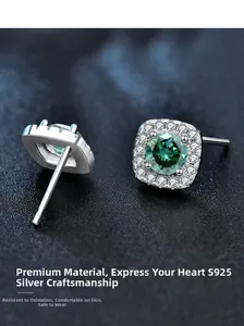 Macro shot of S925 sterling silver square stud earrings with green moissanite center