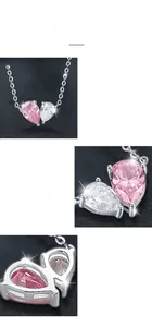 Detail of pink and white zircon heart pendant on 925 silver necklace with prong setting