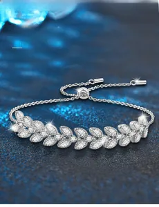 Detailed macro view of 925 sterling silver wheat leaf bracelet with brilliant moissanite stones