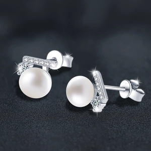 Elegant 925 sterling silver freshwater pearl stud earrings with sparkling moissanite accents