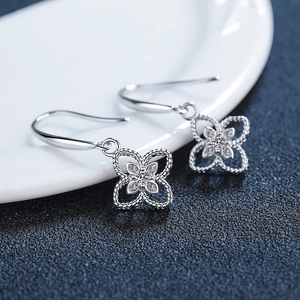 Elegant 925 sterling silver four-leaf clover earrings with sparkling zircon inlay