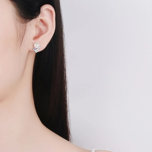 Elegant 925 sterling silver pearl stud earrings with V-shape geometric diamond accents