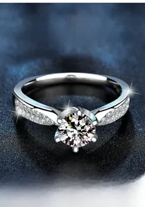 Macro shot of S925 sterling silver six-prong moissanite ring with classic crown setting