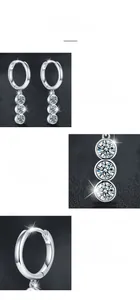 Détail macro de boucles d'oreilles moissanite en argent S925 avec serti clos poli