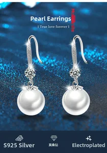Detail of S925 silver pearl earring with sparkling moissanite diamond and textured ear hook