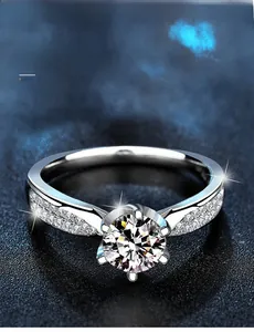 Macro view of S925 sterling silver ring showing 3EX cut moissanite with 58 facets