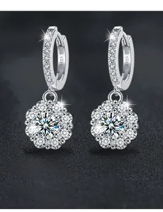 Detailed close-up of S925 sterling silver sunflower earrings with sparkling moissanite stones