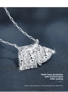 Macro view of rectangle and heart-shaped moissanite pendants with 925 silver plating
