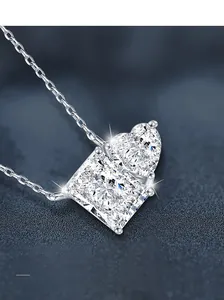 Detailed close-up of S925 silver necklace with heart and square cut moissanite pendants