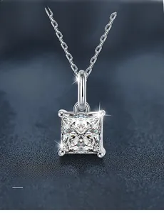 Close-up of 3EX cut princess square moissanite pendant with four-prong 925 silver setting