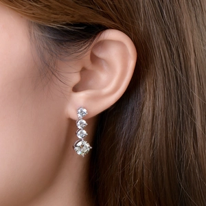 Elegant 925 sterling silver drop earrings featuring four graduated round moissanite stones