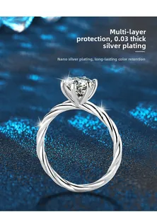 Macro detail of moissanite ring with twisted band and 0.03mm silver plating finish