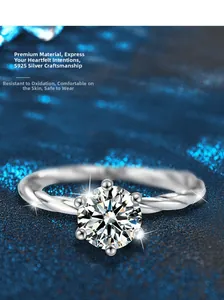 Macro view of S925 sterling silver twisted band ring with six-prong moissanite setting