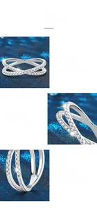 Detailed macro view of crisscross 925 silver ring with moissanite pave claw setting