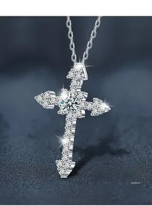 Detailed macro view of S925 sterling silver cross pendant with sparkling moissanite inlay