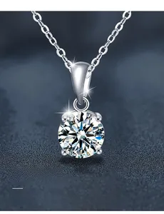 Macro shot of 925 silver moissanite pendant featuring 3EX round cut and four-prong setting