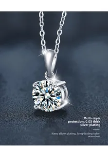 Detailed close-up of classic 4-prong moissanite pendant with thick silver plating
