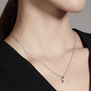 Minimalist S925 sterling silver necklace with a princess cut moissanite pendant on model