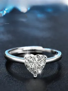 Macro shot of S925 sterling silver ring featuring a heart-cut moissanite stone
