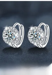 Macro shot of S925 sterling silver sunflower earrings with sparkling moissanite stones